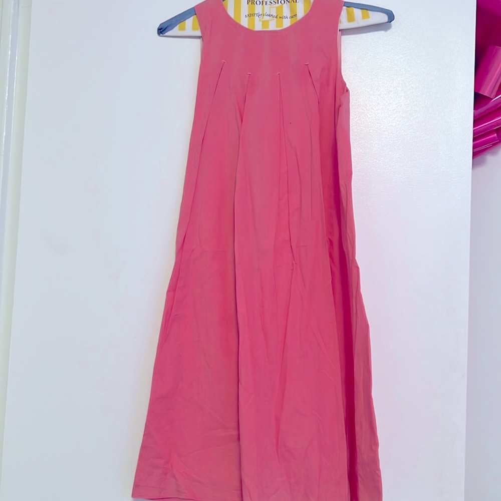 This is a cute salmon colored dress and it perfect for anytime!